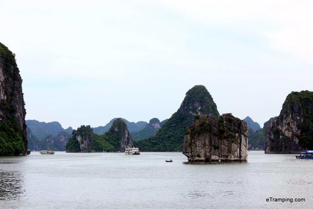 Various limestone islands rising from the sea in Ha Long Bay.