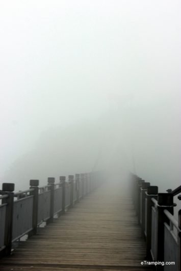Bridge disappearing in the clouds