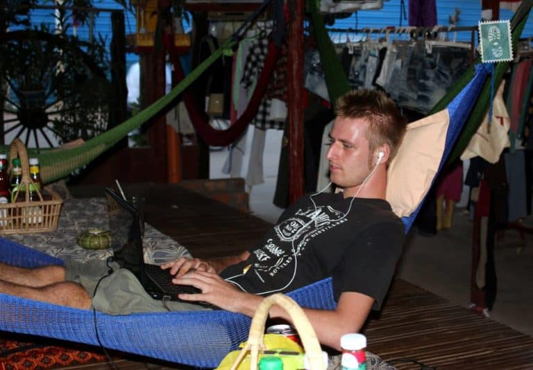 Working on a hammock at Orchidae Guest House, Siem Reap, Cambodia