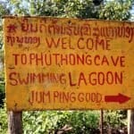 Sign pointing to Swimming Lagoon in Vang Vieng (jumping good)