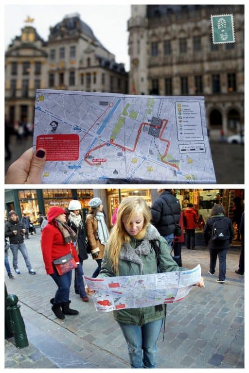 Confused girl trying to read a map of Brussels