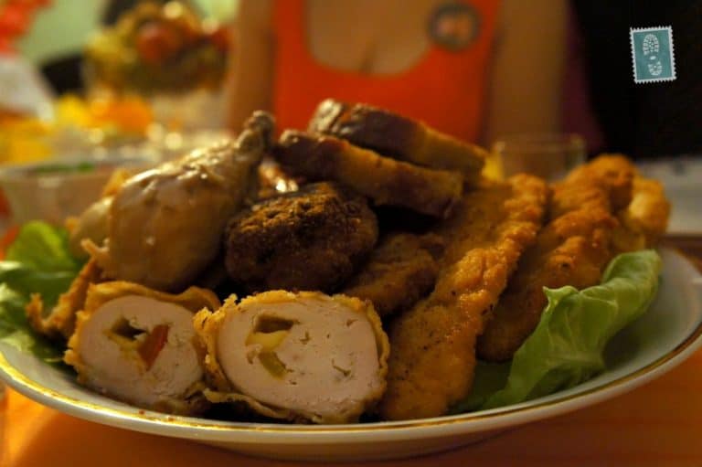 A plate of pork chops and meatballs