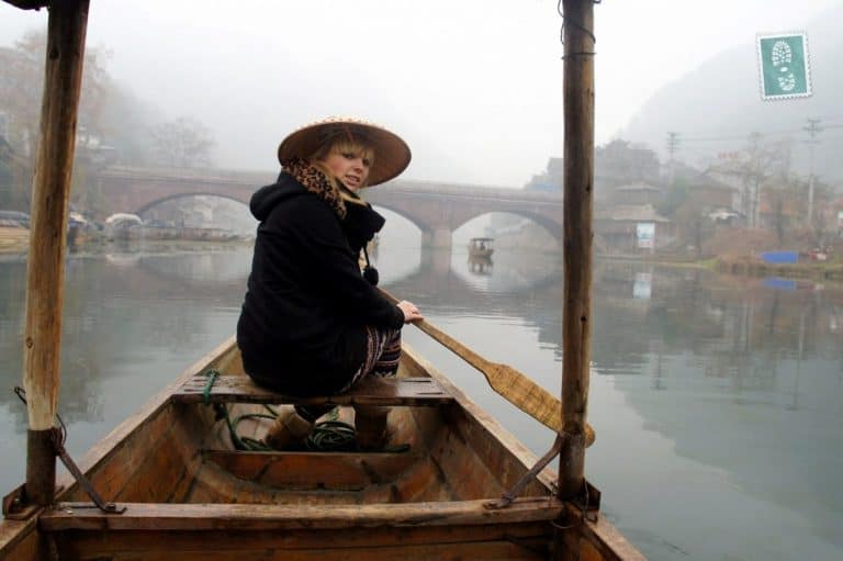 A girl on a boat in Fenghuang