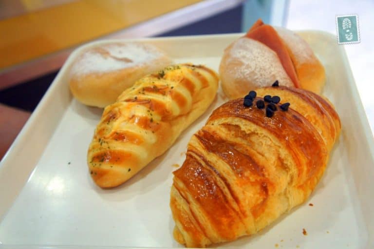 chocolate croissant, had bun, garlic bread and mini cheese soft baguette