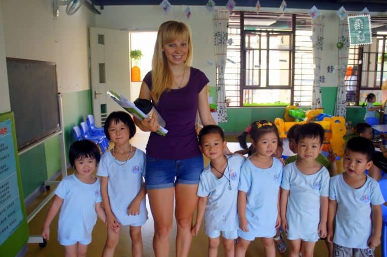 A young teacher with Chinese students