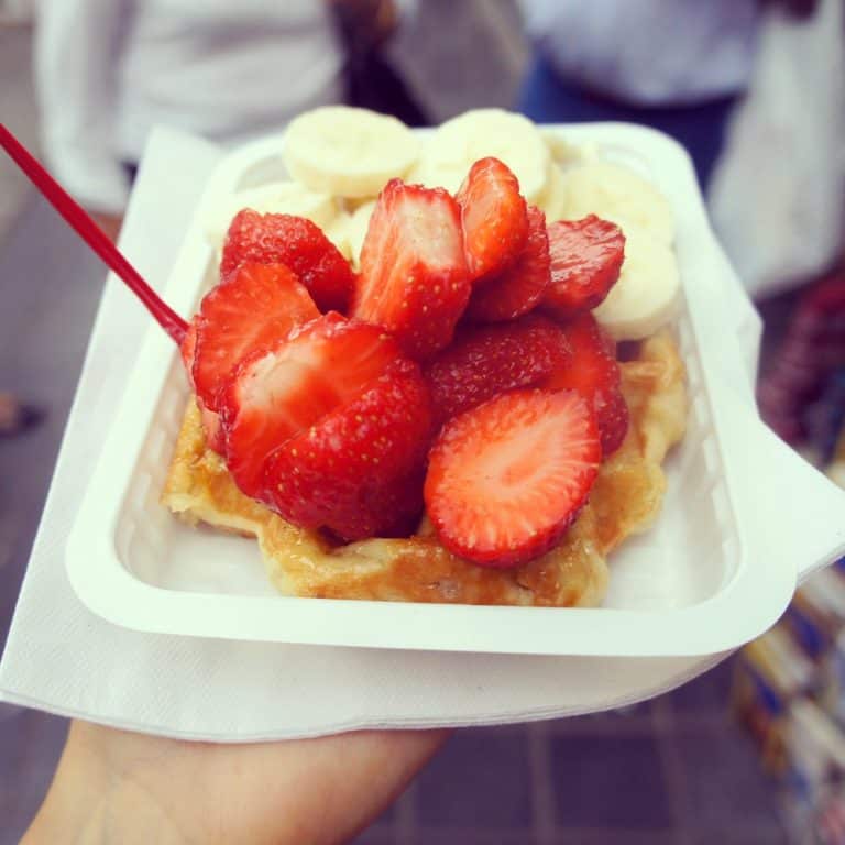 Belgian waffle with bananas and fruits