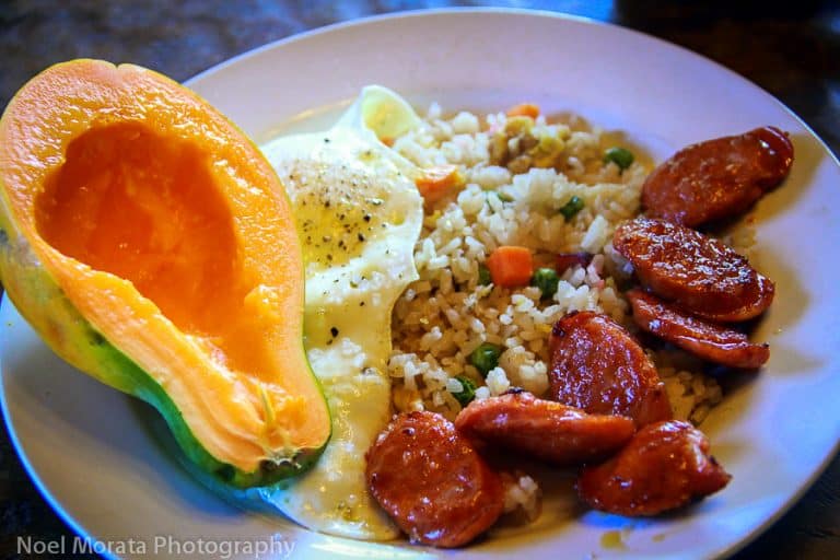 Hawaiian breakfast : mango, avocado, rice, egg and sausages