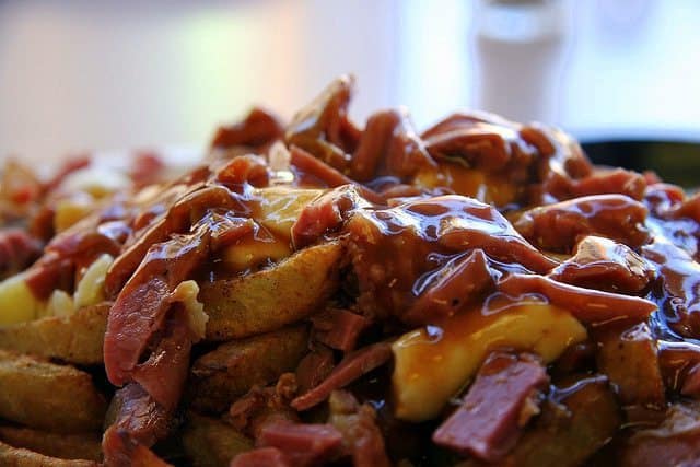 Poutine with bacon - not Canada's prettiest dish, but it's incredibly good and immensely cheap