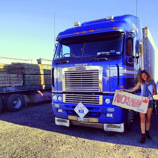 A girl hitchhiking in New Zealand