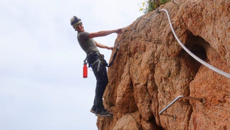 An example of the footholds and steel cable, with some guy lurking about