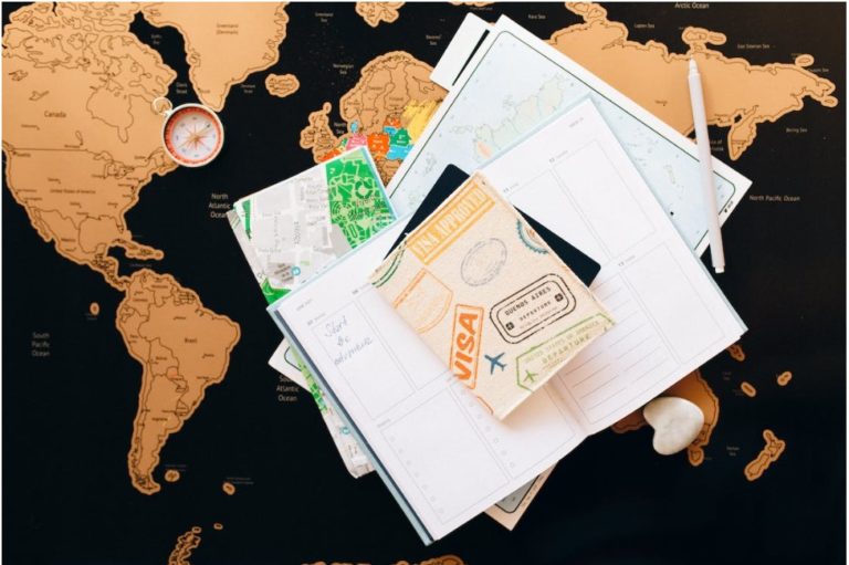 travel visa on the backdrop of a world map
