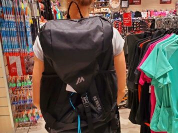 black long backpack with front flap
