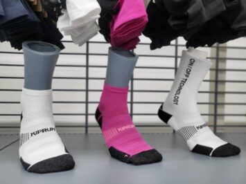 display of white socks and pink socks mannequin