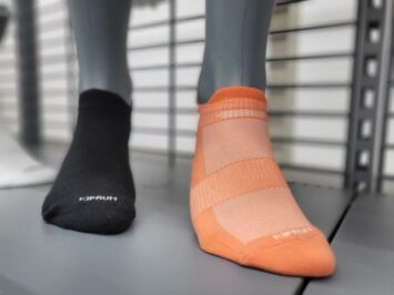 orange black socks mannequin