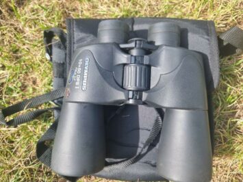 top down binoculars on grass