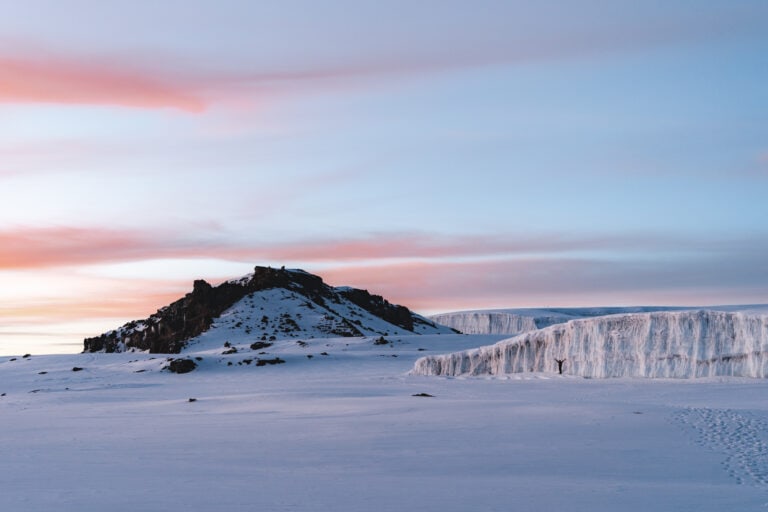 Kilimanjaro Group Expedition across snowy land Be prepared to be exposed to a stunning view once you reach your destination.