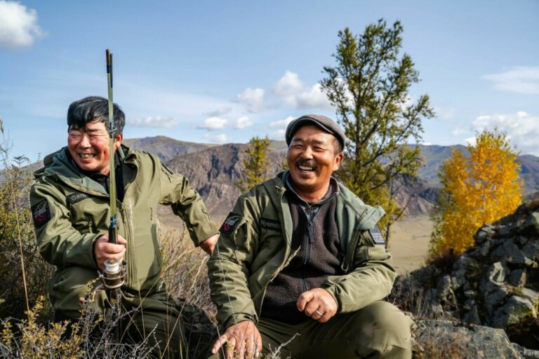 Mongolian hunters telling a joke